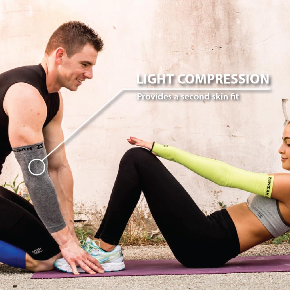 Zensah Zensah Compression Arm Sleeves - Made in USA, Thermal Arm Warmers for Cycling and Running with UV Sun Protection (Neon Pink, Small/Medium)