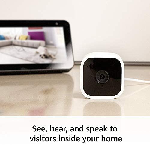 Blink Blink Mini - Compact indoor plug-in smart security camera, 1080p HD video, night vision, motion detection, two-way audio, easy set up, Works with Alexa 3 cameras (White)