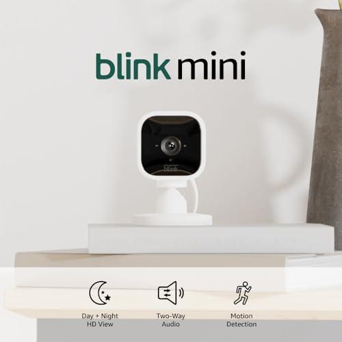 Blink Blink Mini - Compact indoor plug-in smart security camera, 1080p HD video, night vision, motion detection, two-way audio, easy set up, Works with Alexa 3 cameras (White)